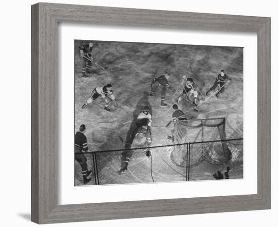 NY Rangers' Goal is Characteristic of Chicago Black Hawks Style of Attack in Ice Hockey Game-Frank Scherschel-Framed Premium Photographic Print