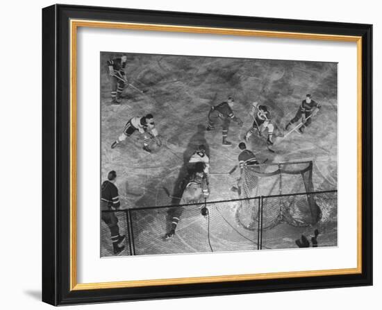NY Rangers' Goal is Characteristic of Chicago Black Hawks Style of Attack in Ice Hockey Game-Frank Scherschel-Framed Premium Photographic Print