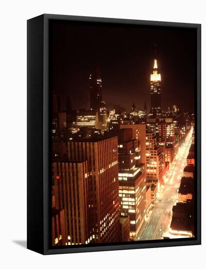 NYC Looking Down Sixth Avenue with Lights After Blackout with Empire State Building in Background-Ralph Morse-Framed Premier Image Canvas