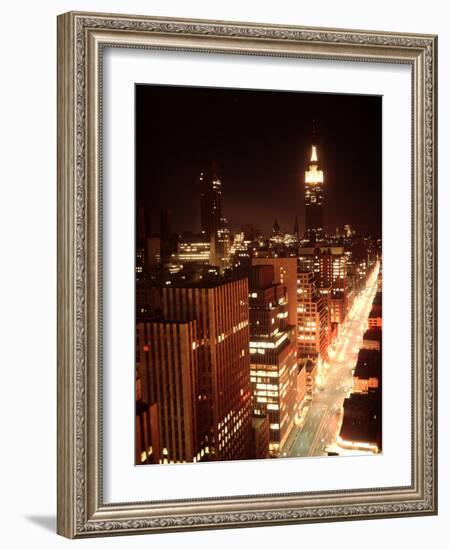 NYC Looking Down Sixth Avenue with Lights After Blackout with Empire State Building in Background-Ralph Morse-Framed Photographic Print