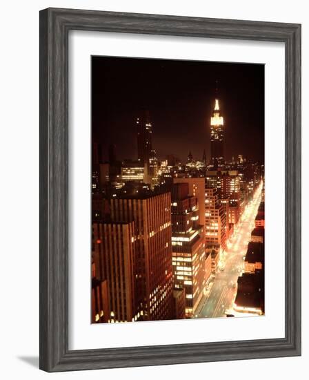 NYC Looking Down Sixth Avenue with Lights After Blackout with Empire State Building in Background-Ralph Morse-Framed Photographic Print