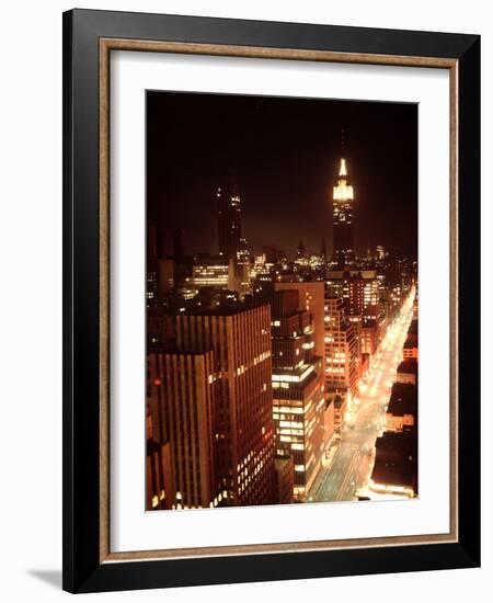 NYC Looking Down Sixth Avenue with Lights After Blackout with Empire State Building in Background-Ralph Morse-Framed Photographic Print