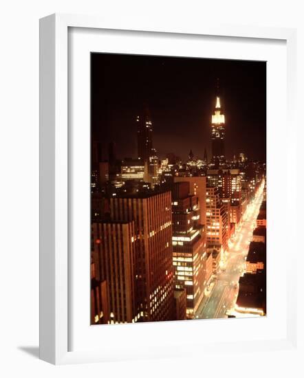NYC Looking Down Sixth Avenue with Lights After Blackout with Empire State Building in Background-Ralph Morse-Framed Photographic Print