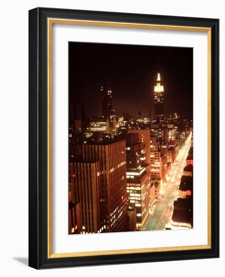 NYC Looking Down Sixth Avenue with Lights After Blackout with Empire State Building in Background-Ralph Morse-Framed Photographic Print