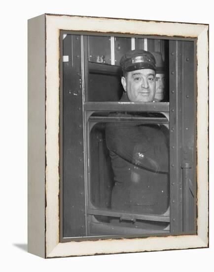 Nyc Mayor Fiorello Laguardia Wearing Motorman's Cap and Looking Out Window on Subway-null-Framed Premier Image Canvas