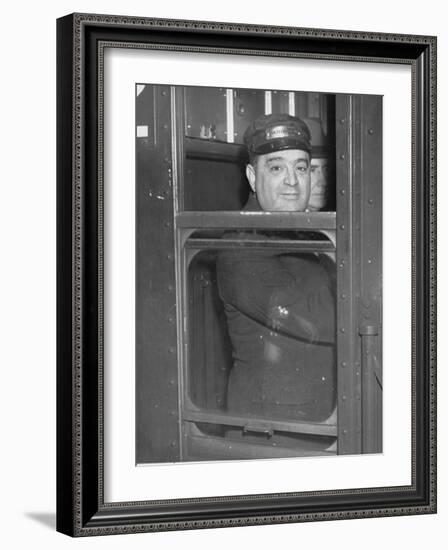 Nyc Mayor Fiorello Laguardia Wearing Motorman's Cap and Looking Out Window on Subway-null-Framed Photographic Print
