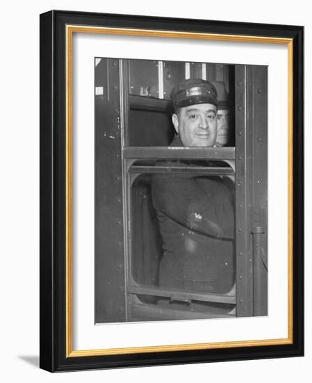 Nyc Mayor Fiorello Laguardia Wearing Motorman's Cap and Looking Out Window on Subway-null-Framed Photographic Print