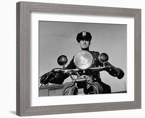 NYPD Motorcycle Cop Francis Kennedy Patrolling the Streets on His Bike-Carl Mydans-Framed Photographic Print