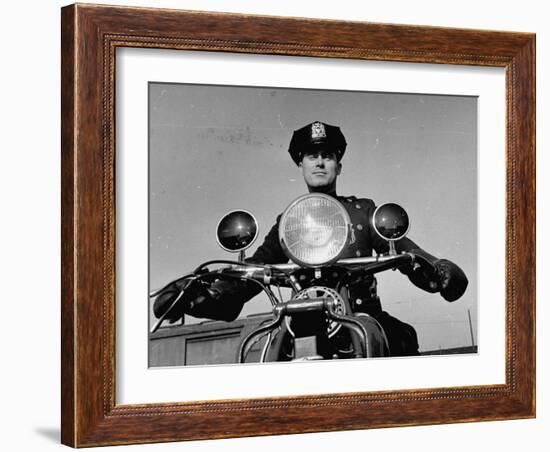 NYPD Motorcycle Cop Francis Kennedy Patrolling the Streets on His Bike-Carl Mydans-Framed Photographic Print