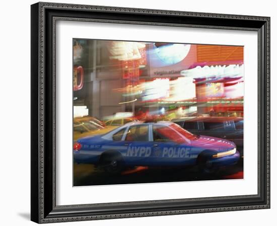 Nypd Police Car Speeding Through Times Square, New York City, New York, USA-null-Framed Photographic Print
