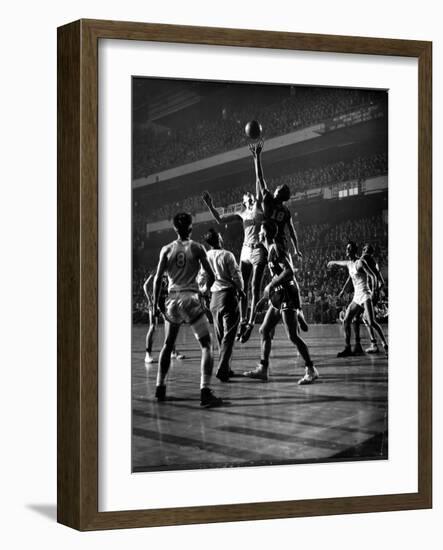 NYU vs. North Carolina in College Basketball Game at Madison Square Garden-Gjon Mili-Framed Photographic Print