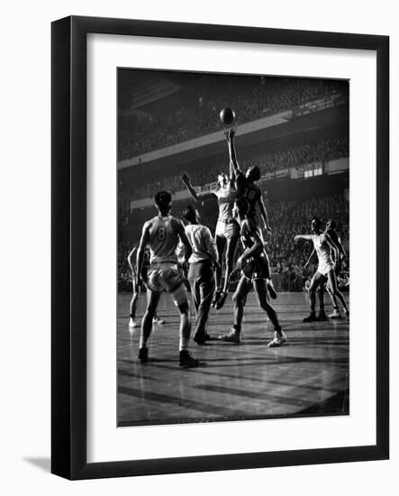 NYU vs. North Carolina in College Basketball Game at Madison Square Garden-Gjon Mili-Framed Photographic Print