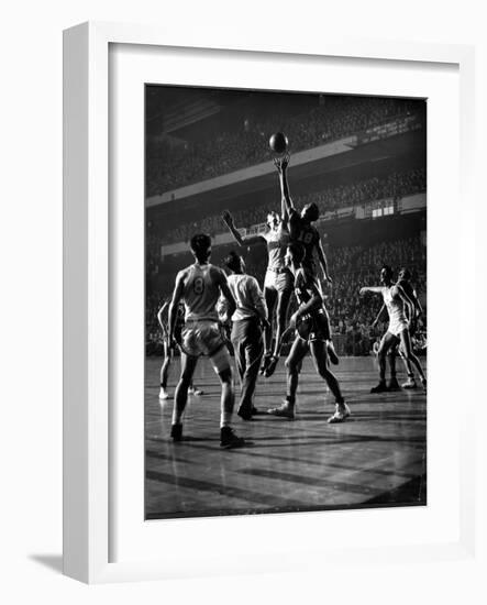 NYU vs. North Carolina in College Basketball Game at Madison Square Garden-Gjon Mili-Framed Photographic Print