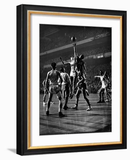 NYU vs. North Carolina in College Basketball Game at Madison Square Garden-Gjon Mili-Framed Photographic Print