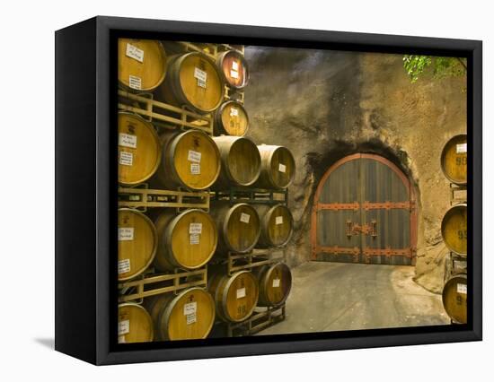 Oak Barrels Stacked Outside of Door at Ironstone Winery, Calaveras County, California, USA-Janis Miglavs-Framed Premier Image Canvas