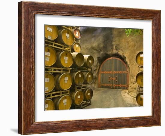 Oak Barrels Stacked Outside of Door at Ironstone Winery, Calaveras County, California, USA-Janis Miglavs-Framed Photographic Print