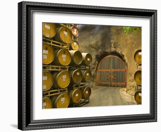 Oak Barrels Stacked Outside of Door at Ironstone Winery, Calaveras County, California, USA-Janis Miglavs-Framed Photographic Print