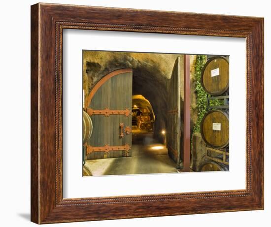 Oak Barrels Stacked Outside of Open Door To Aging Caves at Ironstone Winery, California, USA-Janis Miglavs-Framed Photographic Print