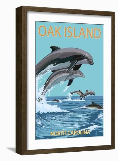 Oak Island, North Carolina - Dolphins Jumping-Lantern Press-Framed Art Print