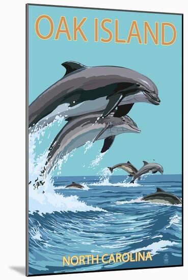 Oak Island, North Carolina - Dolphins Jumping-Lantern Press-Mounted Art Print