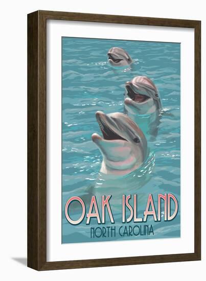 Oak Island, North Carolina - Dolphins Swimming-Lantern Press-Framed Art Print