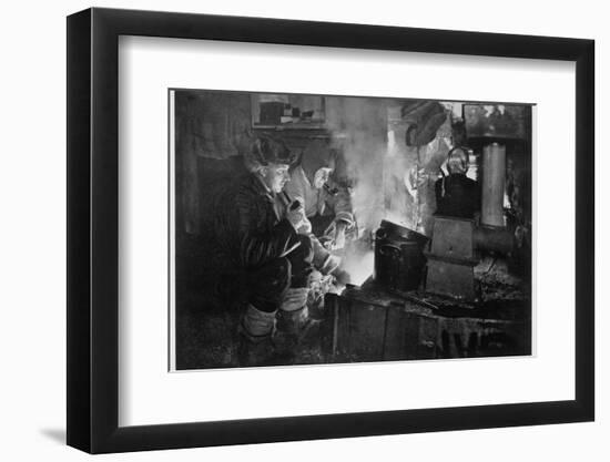 'Oates and Meares at the Blubber Stove in the Stables', Antarctica, 1911-Herbert Ponting-Framed Photographic Print