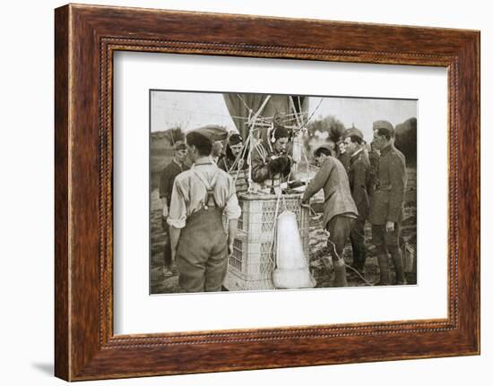 Observer of a kite-balloon testing the telephone before ascending, France, World War I,1916-Unknown-Framed Photographic Print