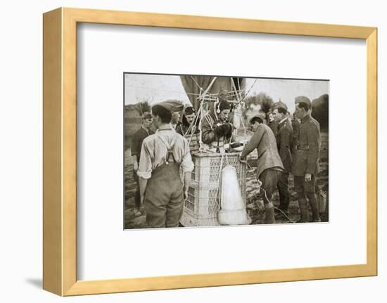 Observer of a kite-balloon testing the telephone before ascending, France, World War I,1916-Unknown-Framed Photographic Print