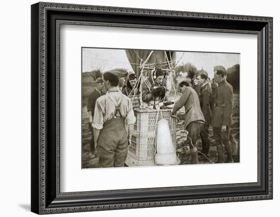 Observer of a kite-balloon testing the telephone before ascending, France, World War I,1916-Unknown-Framed Photographic Print