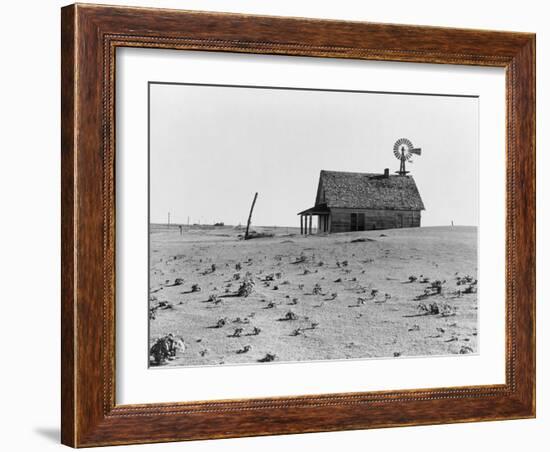 Occupied house in Dalhart, Texas where most are abandoned in the drought, 1938-Dorothea Lange-Framed Photographic Print