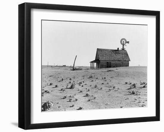 Occupied house in Dalhart, Texas where most are abandoned in the drought, 1938-Dorothea Lange-Framed Photographic Print