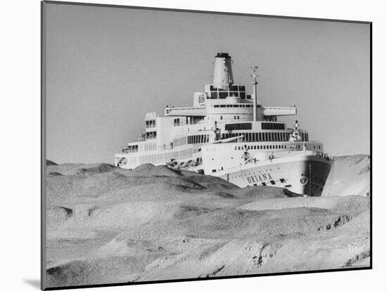 Ocean Liner "Oriana" Passing Through Desert Dunes Going Through Suez Canal-John Dominis-Mounted Photographic Print