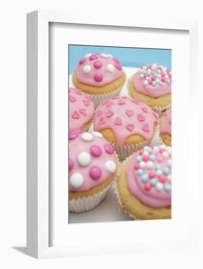 Of Muffin, Icing, Pink, Hearts, Chocolate Beans, Sugar Pearls, Detail, Blur-Nikky-Framed Photographic Print