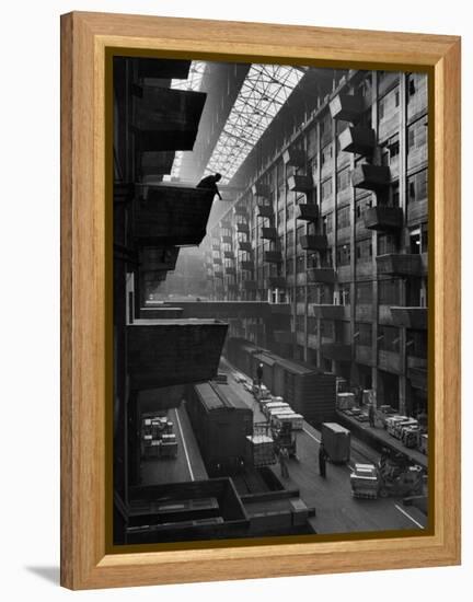 Off-Loaded Freight From Box Cars Being Hoisted Up to Jutting Loading Platforms, Brooklyn Army Base-Andreas Feininger-Framed Premier Image Canvas