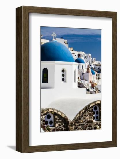 Oia, Greece. Row of Greek Orthodox Churches with blue domes.-Jolly Sienda-Framed Photographic Print