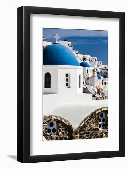 Oia, Greece. Row of Greek Orthodox Churches with blue domes.-Jolly Sienda-Framed Photographic Print