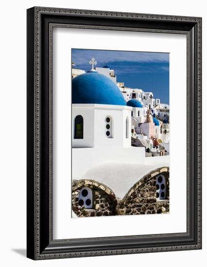 Oia, Greece. Row of Greek Orthodox Churches with blue domes.-Jolly Sienda-Framed Photographic Print