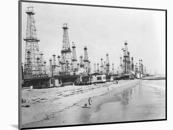Oil Derricks on a Beach in California-null-Mounted Photographic Print