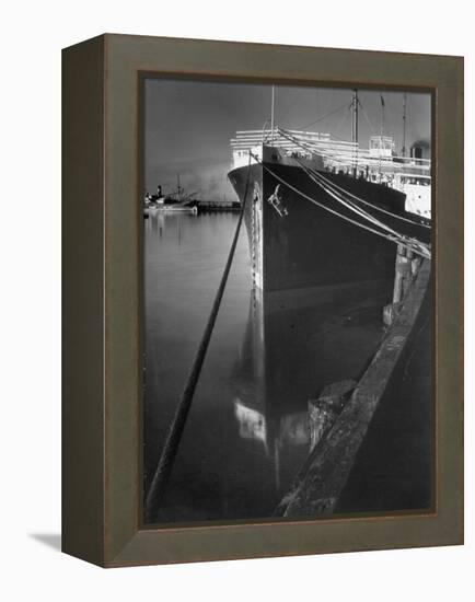 Oil Tanker Tied Up at Dock While it Is Being Loaded with Barrels of Oil-Margaret Bourke-White-Framed Premier Image Canvas