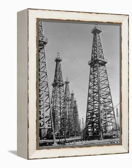 Oil Well Rigs in a Texaco Oil Field-Margaret Bourke-White-Framed Premier Image Canvas