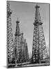 Oil Well Rigs in a Texaco Oil Field-Margaret Bourke-White-Mounted Photographic Print