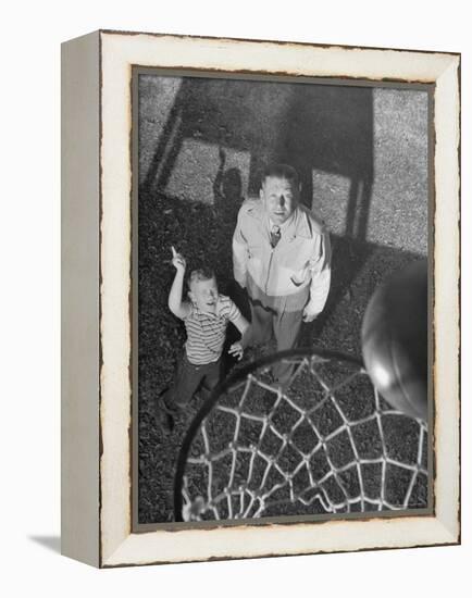 Oklahoma A&M Basketball Coach Hank Iba Watching a Young Boy Shooting a Basket-Myron Davis-Framed Premier Image Canvas