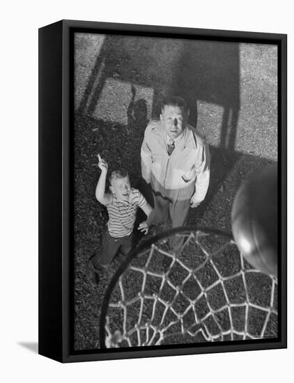 Oklahoma A&M Basketball Coach Hank Iba Watching a Young Boy Shooting a Basket-Myron Davis-Framed Premier Image Canvas