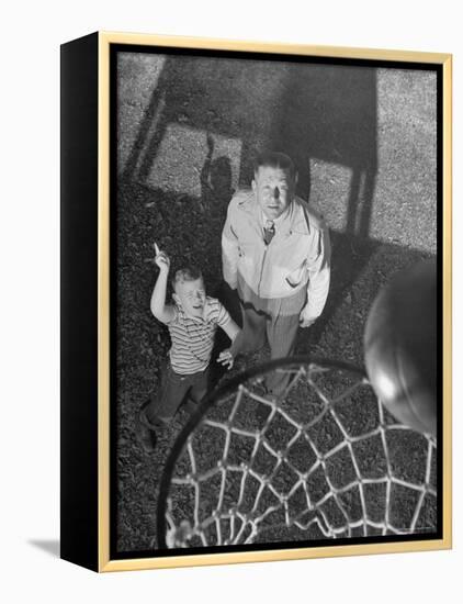 Oklahoma A&M Basketball Coach Hank Iba Watching a Young Boy Shooting a Basket-Myron Davis-Framed Premier Image Canvas