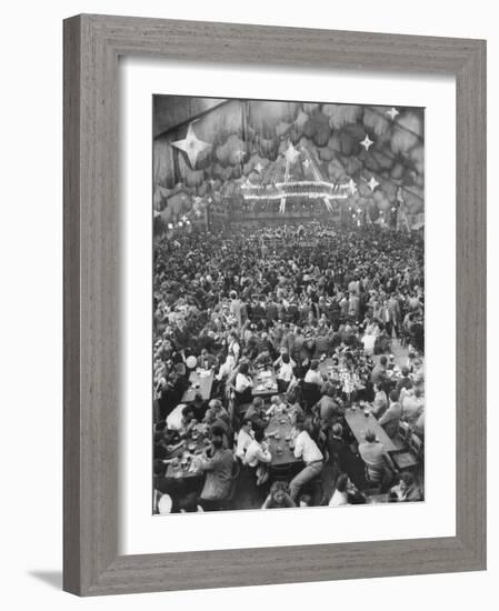 Oktoberfest, Drinking Beer, Singing, Dancing, Tents Setup for Drinking, Band under Canvas Clouds-Frank Scherschel-Framed Photographic Print