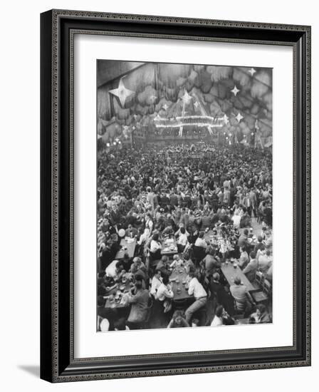 Oktoberfest, Drinking Beer, Singing, Dancing, Tents Setup for Drinking, Band under Canvas Clouds-Frank Scherschel-Framed Photographic Print