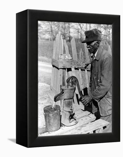 Old African American Sharecropper Dave Alexander Using Water Pump to Draw Water-Alfred Eisenstaedt-Framed Premier Image Canvas