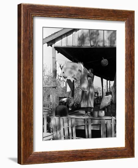 Old African American, Wife of Sharecropper, Lizzie Alexander Hanging Laundry to Dry on Her Porch-Alfred Eisenstaedt-Framed Photographic Print