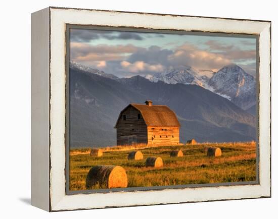 Old Barn Framed By Hay Bales, Mission Mountain Range, Montana, USA-Chuck Haney-Framed Premier Image Canvas