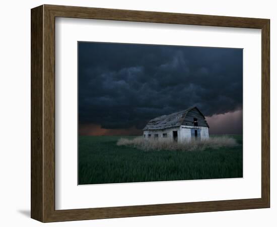 Old Barn Stands in a Wheat Field as a Thunderstorm Passes in the Distance Near Ogallah, Kansas-null-Framed Photographic Print